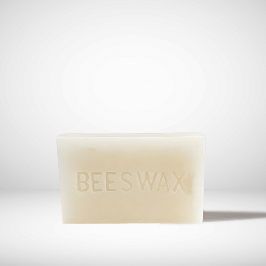 Beeswax bar on a white background