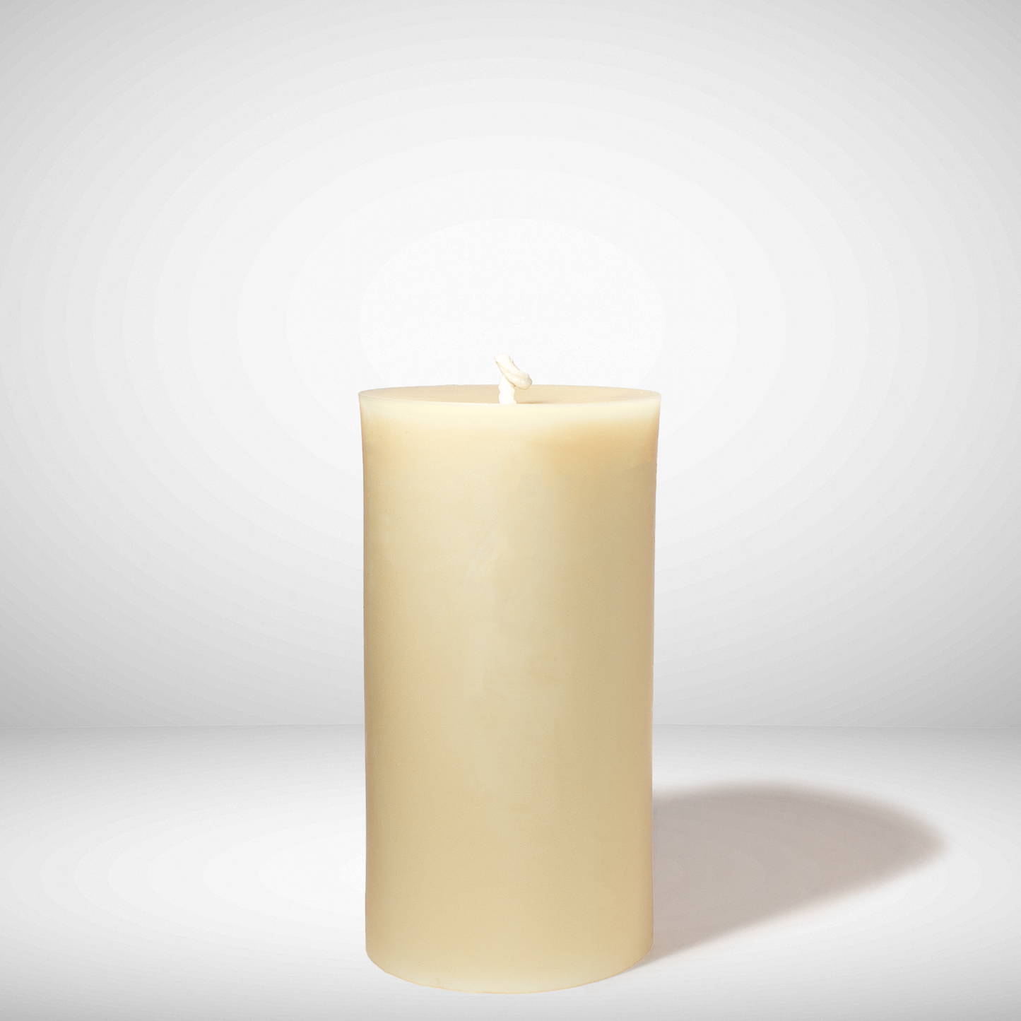 Ivory/white Beeswax candle on a white background
