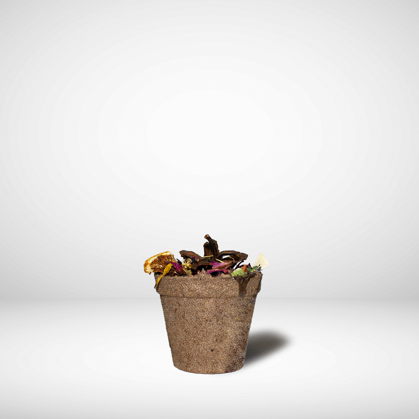 Beeswax Fire starter made from natural ingredients on a white background. 