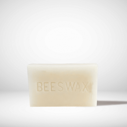 Beeswax bar on a white background